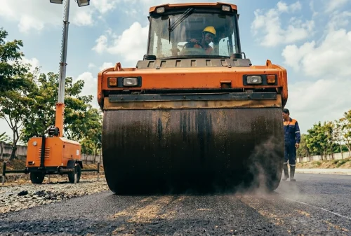 jasa pengaspalan subang menggunakan tandem roller dan aspal hotmix berkualitas