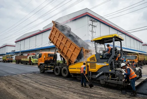 pengaspalan jalan akses gudang logistik di kawasan Cengkareng Jakarta Barat